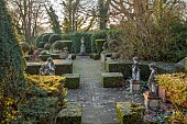 THE LASKETT GARDEN, HEREFORDSHIRE: WINTER, FROST, JANUARY, STATUES, PATHING, YEW HEDGES, HEDGING