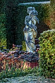 THE LASKETT GARDEN, HEREFORDSHIRE: WINTER, FROST, JANUARY, THE PIERPONT MORGAN ROSE GARDEN, SEDUM MATRONA, STATUE