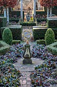 THE LASKETT GARDEN, HEREFORDSHIRE: WINTER, FROST, JANUARY, SILVER JUBILEE GARDEN, BOX PARTERRE, SUNDIAL, BERGENIA, PATH