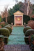 THE LASKETT GARDEN, HEREFORDSHIRE: WINTER, FROST, JANUARY, PATH, CLIPPED TOPIARY YEW, VICTORIA & ALBERT MUSEUM TEMPLE, PATH