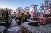 THE LASKETT GARDEN, HEREFORDSHIRE: WINTER, FROST, JANUARY, YEW HEDGES, HEDGING, PATHS, THE BELVEDERE, GARDEN BUILDING