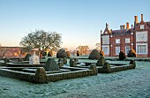 HELMINGHAM HALL GARDENS, SUFFOLK: WINTER, FROST, JANUARY, BOX PARTERRE, CLIPPED TOPIARY YEW
