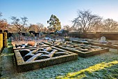 HELMINGHAM HALL GARDENS, SUFFOLK: WINTER, FROST, JANUARY, THE KNOT GARDEN, BOX HEDGES, HEDGING, YEW HEDGES