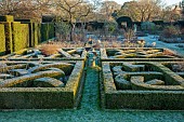 HELMINGHAM HALL GARDENS, SUFFOLK: WINTER, FROST, JANUARY, THE KNOT GARDEN, BOX HEDGES, HEDGING, YEW HEDGES
