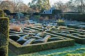 HELMINGHAM HALL GARDENS, SUFFOLK: WINTER, FROST, JANUARY, THE KNOT GARDEN, BOX HEDGES, HEDGING, YEW HEDGES