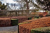 LITTLETHORPE MANOR, YORKSHIRE, FEBRUARY, WINTER GARDEN: FRONT GRAVEL DRIVE, HEDGES, HEDGING, BEECH, YEW, PLEACHED HORNBEAM