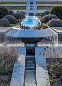LITTLETHORPE MANOR, YORKSHIRE, FEBRUARY, WINTER GARDEN: STAINLESS STEEL RILL, WATER FEATURE