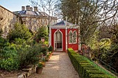 PAINSWICK ROCOCO GARDEN, GLOUCESTERSHIRE: MARCH, SPRING, PATH TO THE EAGLE HOUSE, FOLLY, FOLLIES