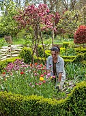 THE OLD RECTORY WARBLETON, EAST SUSSEX, APRIL, HEAD GARDENER SHARNEE GATES IN THE POTAGER, VEGETABLE, GARDEN