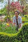 THE OLD RECTORY WARBLETON, EAST SUSSEX, APRIL, HEAD GARDENER SHARNEE GATES IN THE POTAGER, VEGETABLE, GARDEN
