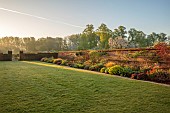 COUGHTON COURT, WARWICKSHIRE: MAY, LAWN, LONG BORDER, WALLED GARDEN, SUNRISE, TULIP BRONZE PERFECTION