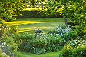 THE OLD VICARAGE, WORMLEIGHTON, WARWICKSHIRE: DESIGNER ANGEL COLLINS - BORDER, ALLIUM MOUNT EVEREST, SUNDIAL, LAWN