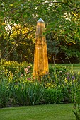 THE OLD VICARAGE, WORMLEIGHTON, WARWICKSHIRE: DESIGNER ANGEL COLLINS - BORDER, EVENING SUNSHINE REFLECTING OFF OBELISK