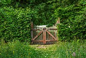 PIE CORNER, HERTFORDSHIRE: WOODEN GATE INTO OX EYE MEADOW, JUNE