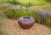 OLD PARK BARN, BUCKINGHAMSHIRE: GRASSES, MELICA CILIATA, SILKY- SPIKE MELIC, NEPETA HILL GROUNDS, WILDFLOWERS, GRAVEL GARDEN,  SCULPTURE, CONTAINER BY HANNAH BENNETT