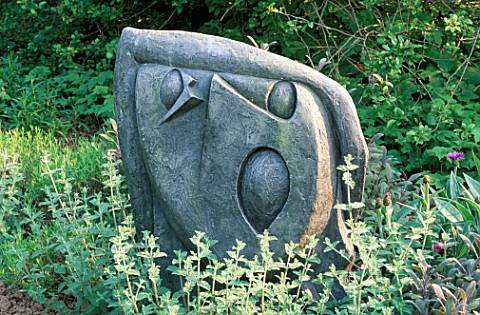 SCULPTURE_BY_HELEN_SINCLAIR_SURROUNDED_BY_NEPETA_SIX_HILLS_GIANT_ARROW_COTTAGE__HEREFORDSHIRE