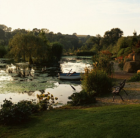 THE_LAKE_AND_ROWING_BOAT_AT_LADY_FARM__SOMERSET