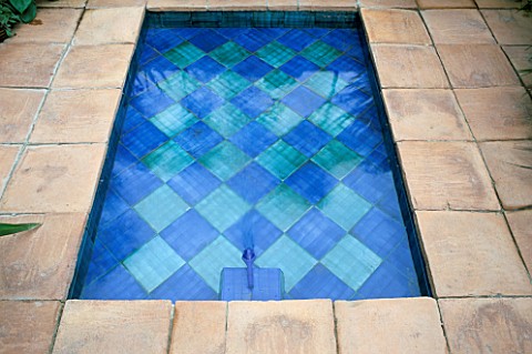 WATER_FEATURE_BLUE_GLAZED_TILED_POOL_SURROUNDED_BY_TERRACOTTA_PAVING_NEWBURY_AGRICULTURAL_SOCIETY_CO