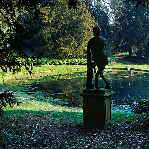 A_SATYR_BECKONS_TOWARDS_THE_WOODS_IN_KENTS_VALE_OF_VENUS__ROUSHAM_LANDSCAPE_GARDEN__OXFORDSHIRE