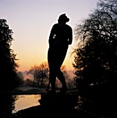 STATUE OF VENUS SILHOUETTED AGAINST THE DAWN SKY.  ROUSHAM LANDSCAPE GARDEN  OXFORDSHIRE/NEW SHOOTS