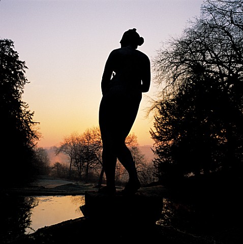 STATUE_OF_VENUS_SILHOUETTED_AGAINST_THE_DAWN_SKY__ROUSHAM_LANDSCAPE_GARDEN__OXFORDSHIRENEW_SHOOTS