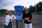 PROJECT ARCHITECTS ULF NORDFJELL AND KRISTINA HULTERSTROM ON EITHER SIDE OF THE URN BY MARIE PARUP.   HEDENS LUSTGARD  SWEDEN