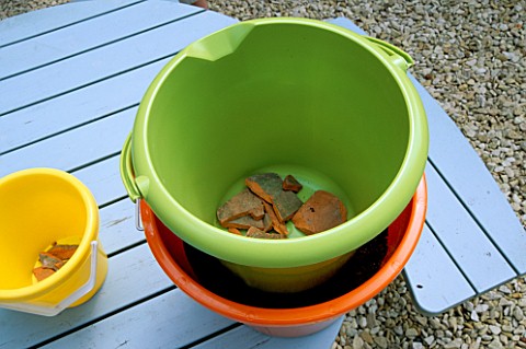 COLOURFUL_SEASIDE_BUCKETS_WITH_CROCS_AND_COMPOST