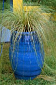 BLUE GLAZED CERAMIC POT PLANTED WITH CAREX COMANS FROSTED CURLS