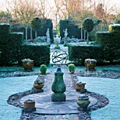 ARMILLARY SPHERE IN CENTRE OF FORMAL JUBILEE GARDEN IN FROST. SIR ROY STRONGS GARDEN  HEREFORD &  WORCESTER