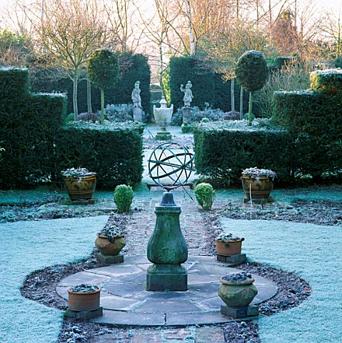 ARMILLARY_SPHERE_IN_CENTRE_OF_FORMAL_JUBILEE_GARDEN_IN_FROST_SIR_ROY_STRONGS_GARDEN__HEREFORD___WORC