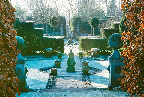 ARMILLARY_SPHERE_AT_CENTRE_OF_FORMAL_JUBILEE_GARDEN_IN_FROST_SIR_ROY_STRONGS_GARDEN__HEREFORD___WORC