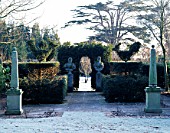 GWENT GARDEN A THEATRE FLANKED BY 2 OBELISKS.IN B/G IS CEDAR OF LEBANON.  SIR ROY STRONGS GARDEN HEREFORD AND WORCESTER