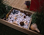 CHILDRENS DECK GARDEN: DECKED PLAY SURFACE WITH GREEN FENCE  WENDY HOUSE  MATTING WATER FEATURE  BLACKBOARD  SWING   WOODEN BENCHES AND SANDPIT