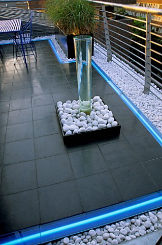 ROOF_GARDEN_DETAIL_WATER_FEATURE_WITH_WHITE_COBBLES__NEON_STRIP_LIGHTING__AND_BLACK_SLATE_GARDEN_DES