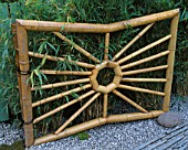 BAMBOO GATE AT ENTRANCE TO WORLD OF KOI GARDEN  CHELSEA 2002. DESIGNERS ROY DAY AND STEVE HICKLING