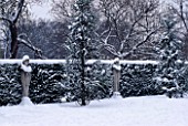 SNOW COVERS STATUES IN THE GARDEN AT CHISWICK HOUSE  LONDON