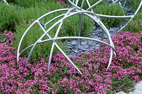 PINK_THYME_WITH_METAL_GLOBES_TATTON_PARK_2002__DESIGNER_MYFANWY_JONES
