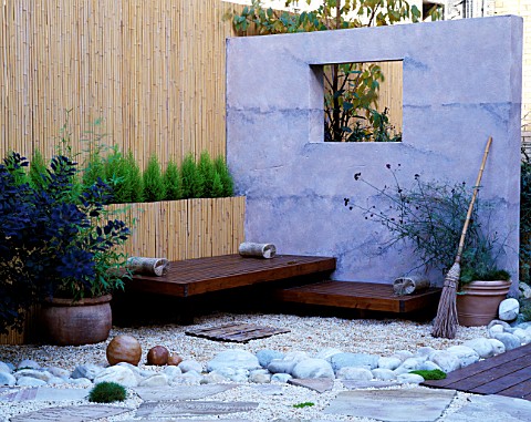 ROOF_GARDEN_BAMBOO_FENCE__WHITE_BOULDERS__RED_CEDAR_DECK_AND_SEATS__RENDERED_WALL_WITH_WINDOW_AND_BE