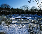 THE SNOW COVERED CIRCULAR  SUNKEN ROSE GARDEN AT GREAT FOSTERS  SURREY