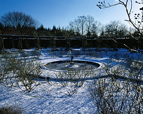 THE_SNOW_COVERED_CIRCULAR__SUNKEN_ROSE_GARDEN_AT_GREAT_FOSTERS__SURREY