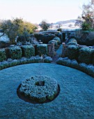THE LANCE HATTATT DESIGN GARDEN AT ARROW COTTAGE  HEREFORDSHIRE  COVERED IN FROST  VIEWED FROM THE COTTAGE