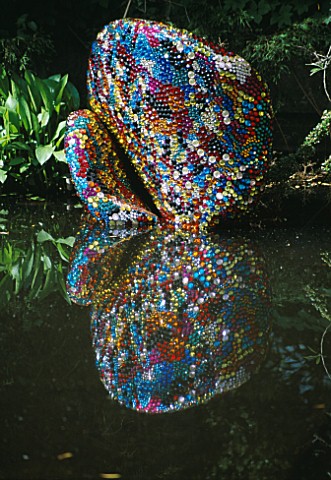DESIGNER_TONY_HEYWOOD_SCULPTURE_IN_WATER_CALLED_ARE_ALL_THINGS_BRIGHT_AND_BEAUTIFUL_MADE_FROM_COLOUR