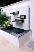 WATER FEATURE ON ROOF TERRACE WITH WHITE WALLSDESIGNER: AMIR SCHLEZINGER/ MY LANDSCAPES