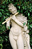 WOODCHIPPINGS  NORTHANTS: STONE PIPER IN HEDGE