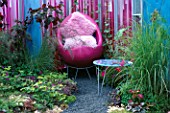 HAMPTON COURT 2004/ DESIGNERS WENDY SMITH AND FERN ALDER: A PLACE TO SIT - PINK FLUID FILLED WALLS  PINK CHAIR AND PINK CUSHIONS