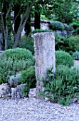 LA CHABAUDE  FRANCE  DESIGNER - PHILIPPE COTTET: STONE AND CLIPPED ROSEMARY