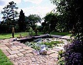 LILY POND WITH FOUR MARBLE SPOUTING FROGS. PARSONAGE  OMBERSLEY  WORCESTERSHIRE