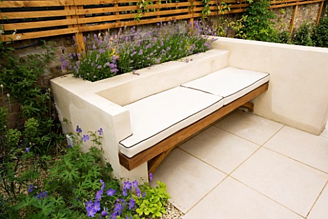 MODERN_BENCH_WITH_CUSHIONS_SET_INTO_LIMEWASHED_RENDERED_WALL___DESIGNER_CHARLOTTE_ROWE