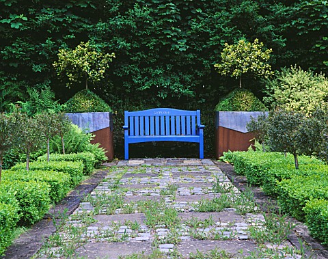 RIDLERS_GARDEN__SWANSEA__WALES_VIEW_ALONG_PATH_PAST_BOX_SQUARES_TO_BLUE_BENCH_WITH_LEAD_AND_RUSTY_ME