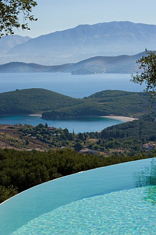 GINA_PRICES_GARDEN__CORFU_VIEW_ACROSS_THE_INFINITY_POOL_TO_THE_IONIAN_SEA_AND_ALBANIAN_MOUNTAINS